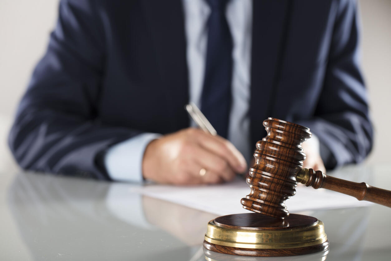 lawyer gavel and writing on the document