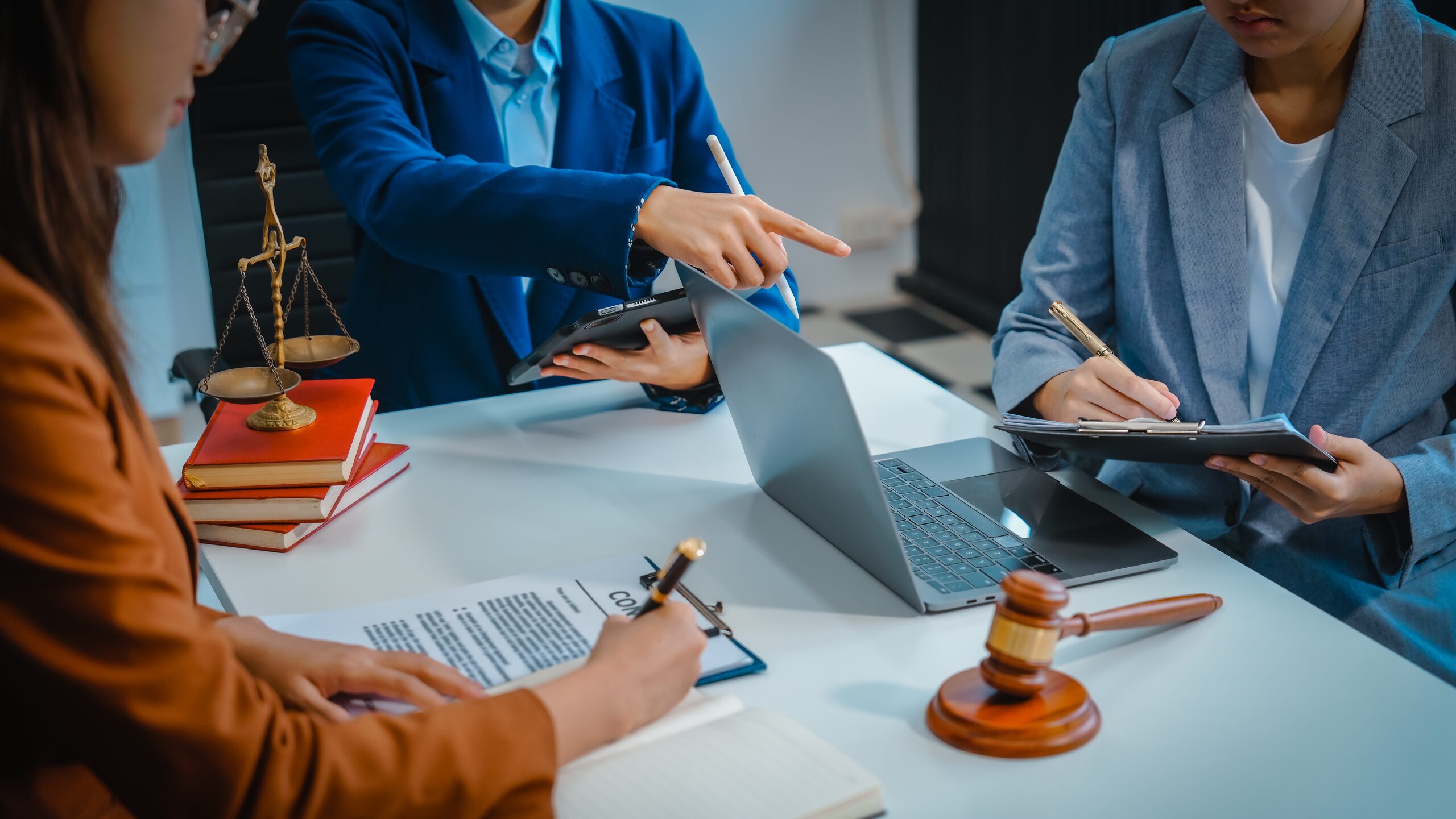 Legal professionals reviewing documents with an uncontested divorce attorney handling a Kansas divorce case.
